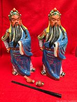 Front view of both Guan Yu statues with accessories