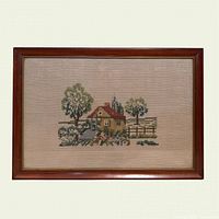 Full frontal view of framed cross-stitch tapestry