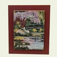 Full view of framed floral pond artwork showing mat and frame