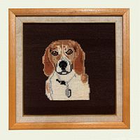 Full view of framed needlepoint beagle portrait