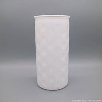 Full front view of milk glass hobnail cylinder vase