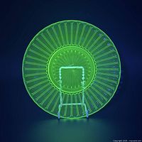 Plate glowing bright green under UV light showing uranium content