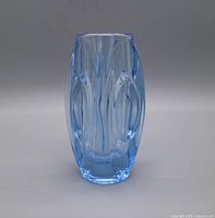 Front view of blue pressed glass vase