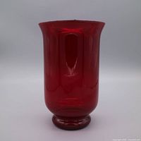front view of ruby red glass vase