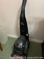 Front view showing overall cleaner, tanks and logo