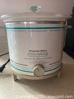 Front view showing brand label, control dial, overall condition