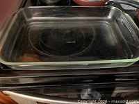 9x12 in. clear glass baking dish on stovetop