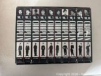 Front view of all 10 VHS tapes in slipcase