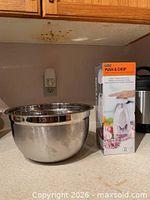 group shot with one stainless steel bowl and boxed chopper