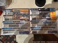 Front view of both sealed tile packs showing design and pack quantity