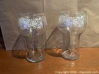Front view of both Pepsi-Cola tumblers showing logo and shape