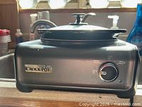 Front view showing Crock-Pot logo, control dial and overall appearance