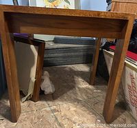 Full view of wood side table underframe and legs