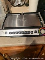 Closed OptiGrill showing stainless lid and control panel