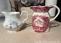 Front view of both jugs side by side