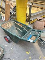 Overall view of cart showing tub, handle, wheels