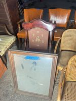 Front view of accent chair among other furniture