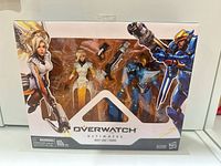 Front view of sealed Overwatch Ultimates Mercy & Pharah two-pack