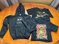 All three garments laid flat on table