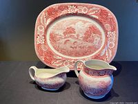 Group image showing pitcher, sauce boat and platter front decoration