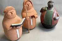 Front view of all three figurines