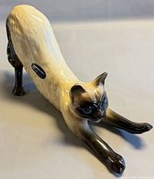Full side view of Coopercraft Siamese cat figurine