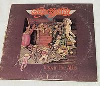 Front cover showing album art and wear