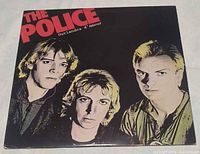 Front jacket featuring band portrait and title