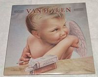 Front album cover with cherub artwork