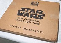 Front of sealed Star Wars Trilogy display box showing printed graphics and instructions