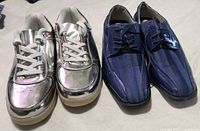 Front view of both pairs showing uppers and laces