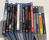 15 media cases standing showing spines