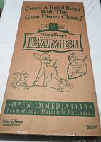 Full view of sealed cardboard display kit showing graphics and promotional text