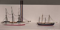Both model boats side by side for scale