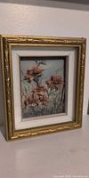 gold framed 3D floral shadow box art