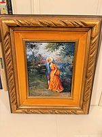 Front view of signed oil painting showing artwork and frame