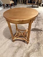 Full view of round gold leaf accent table