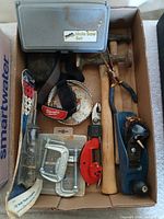 Overall box of assorted tools