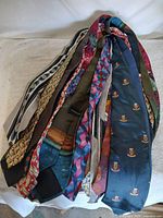 pile of assorted neckties showing variety