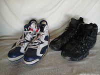 Both pairs of shoes side by side