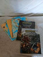 Set laid out showing both booklets and several maps