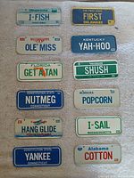 All twelve Kellogg's mini license plates laid out vertically