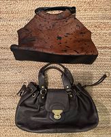 Overview of both purses on floor