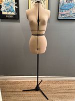 Full view of dress form on tripod base