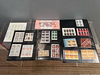 Overview of ten Canadian stamp sheets/panes in stock pages
