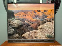 Front view of framed photograph showing full image and title