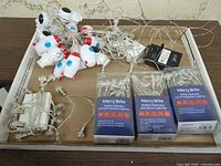 Boxed and loose Merry Brite light sets on tray