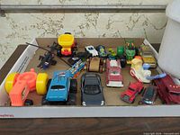 Top view showing entire assortment of vehicles in tray