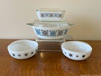 Group shot of all seven pieces stacked and arranged