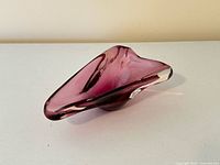 Side view showing amethyst to clear color transition and sculptural form